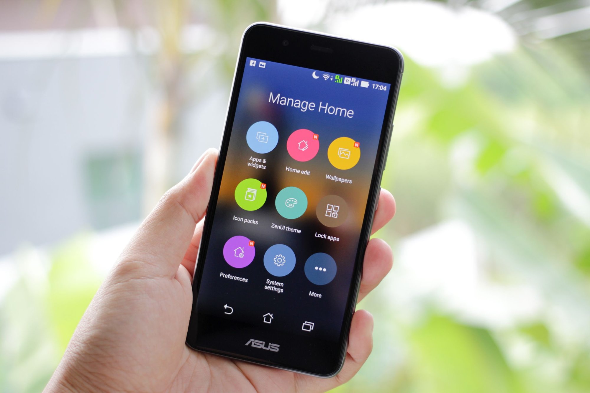 Hand holding a smartphone with a smart home control app