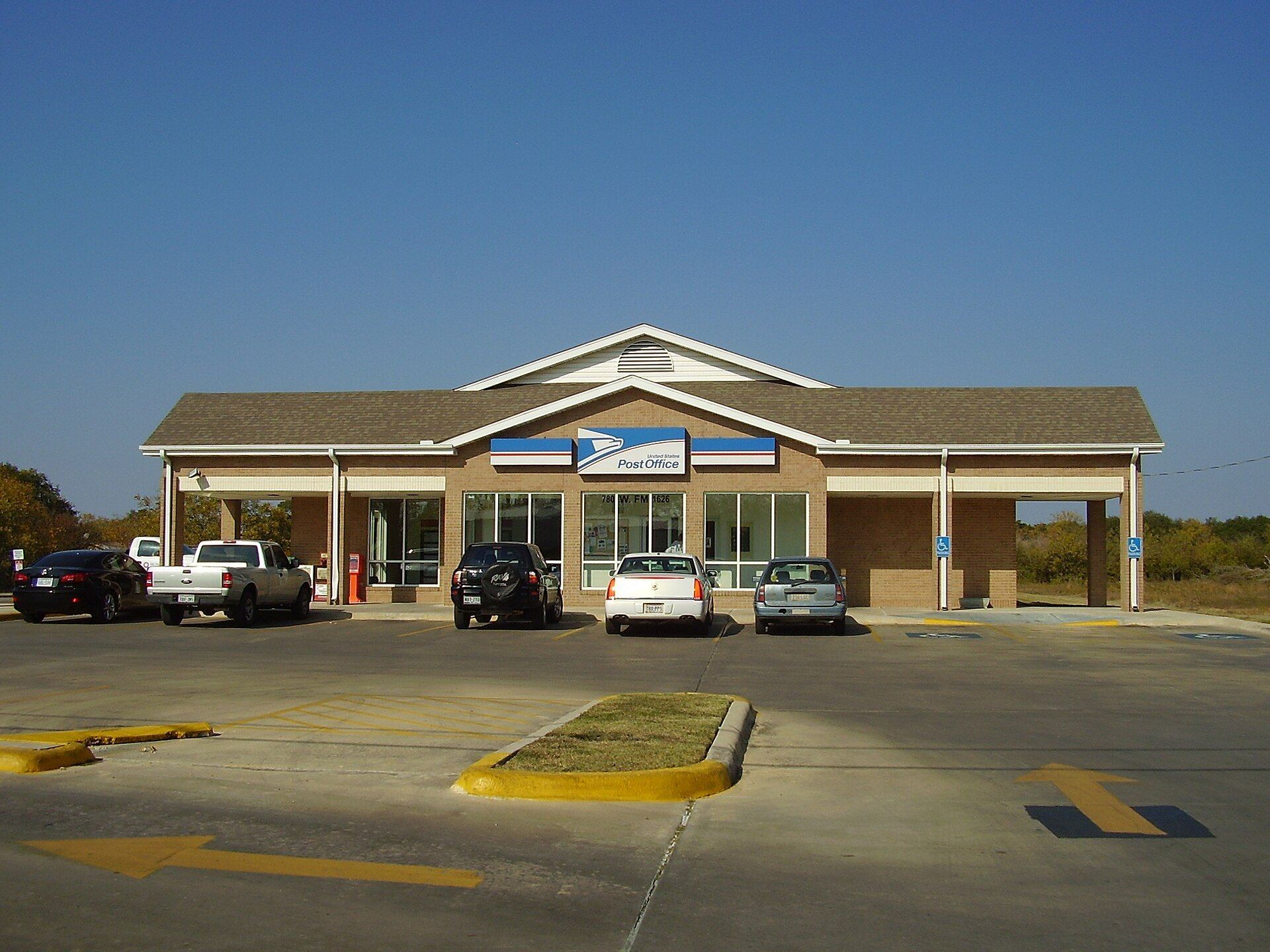 Manchaca Post Office building under a clear blue sky in Manchaca, Texas